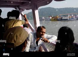 India - Mumbai - Tourists on the ferry ...
