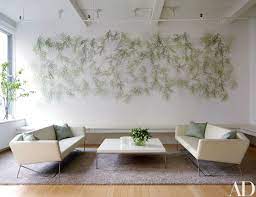 See How A Manhattan Loft Became A Flexible Living Space For A Young Family Architectural Digest Living Room Modern Urban Loft Long Living Room