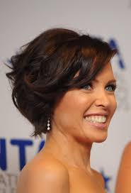 Long hairstyles updos matt cardle and dannii minogue attend a photocall during the x factor press conference at the connaught hotel on december 9, 2010 in london, england. Dannii Minogue Curled Out Bob Dannii Minogue Hair Looks Stylebistro