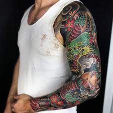 Men choose natural styles for their dragonfly tattoo. 100 Dragon Sleeve Tattoo Designs For Men Fire Breathing Ink Ideas Dragon Sleeve Tattoos Dragon Tattoos For Men Half Sleeve Tattoo