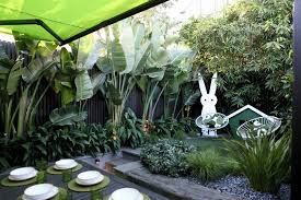 Jenny Smith Gardens Giant Bird Of Paradise Under Planted With Nz Renga Lily Clumping Bamboo At Rear Backyard Landscaping Designs Smith Gardens Garden Design