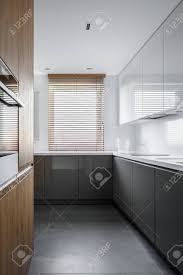 elegant kitchen with wooden blinds