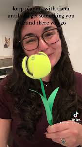 Replying to @AUTUMN Tennis ball tulip supplies: 2 tennis balls, 1 wooden  dowel, green acrylic paint, paint brush, green paper, hot glue, cut proof  gloves, craft knife, strong scissors. #tutorial ...