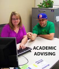 Academic Advisor Julie Nicholson Converses With Acc Student Chris Wilson In The Academic Advising Office Oct 2013 Academic Advising Student Higher Education