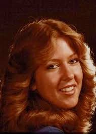 Is the woman in the white coat my doppelganger?