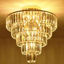 Usually hangs 4 to 8 below the surface of the ceiling. Mondaufie Crystal Chandelier 10 Lights Dimmable Gold Crystal Chandelier Semi Flush Mount Ceiling Light Fixture For Living Room Dining Room Bedroom Bathroom H20 5 X D20 Buy Online In Oman At Oman Desertcart Com Productid