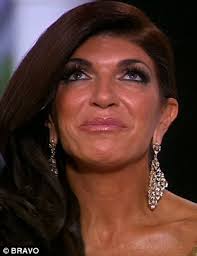 Real Housewives' Teresa Giudice and host Andy Cohen fight back tears