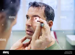 Examination eyes general hi-res stock photography and images