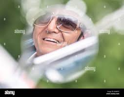 Bad Nauheim, Germany. 18 August 2019. Elvis imitator Gerd Rapp from  Mühlacker poses