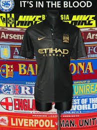 This is the new man city away kit which comes in black and blue shades and will be released at the end of the july. Manchester City Away Football Shirt 2013 2014 Sponsored By Etihad