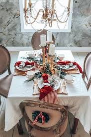 Lay the napkin to the left of the plate. Easy Christmas Table Setting With Red Hallstrom Home