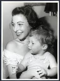 Young Dena Kaye sitting