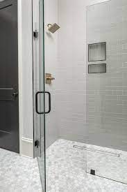 Curbless Shower In Addition To The Beauty Of It There Are A Handful Of Benefits To A Curbless Shower The Walk In Bathroom Showers Shower Floor Bathroom Design