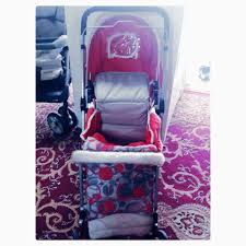 For Sale Baby Trolley Red Price 5 Bd للبيع عربة اطفال بحالة ممتازة لون احمر السعر 5 Bd Tel 33770050 Baby Car Seats Car Seats Baby Car