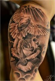 1001 Oberarm Tattoo Designs Beispiele Fur Einen Neuen Look Oberarm Tattoo Tauben Tattoo Rose Tattoo Ideen