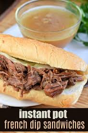 Tender Roasted French Dip Sandwiches Cooked In The Instant Pot Piled On A Crusty French Roll With Extra French Dip Instant Pot French Dip French Dip Sandwich