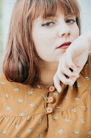 Woman wearing denim jacket photo