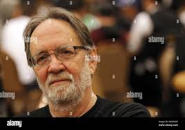 Washington State Gov. Chris Gregoire, goes over math problems with Viche  Thomas and right, Rianna Jordon at Garfield High School during a tour of  the school to announce new reform program in