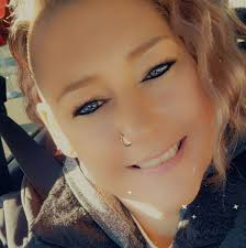 Man pays for coffee order behind him at Scooters