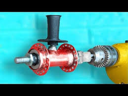 Awesome Device Of The Bicycle Hub And Drill Please Like Subscribe Share Thanks Awesome Idea Http Homemade Tools Dremel Tool Accessories Bicycle Hubs