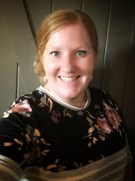 Who specializes in strawberry red hair shades?