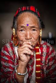 The Limbu women are known for their unique and traditional attire, which is  an integral part of their cultural identity. They adorn themselves with  intricate ornaments and clothing that reflect their rich