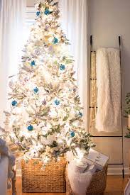 Check spelling or type a new query. Flocked Christmas Tree With Blue Decor The Home I Create