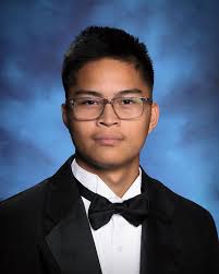 Doddridge County High School graduates cross stage May 21