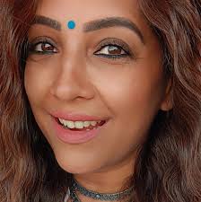 I may not wear Indian clothes all the time but I carry my Indian-ness  everywhere with me... Local jewellery from the markets of India and  colourful bindis always placed in my bag