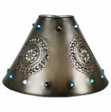 Punched tin is a good material to use for lampshades and candle holders. Mexican Rustic Tin Lamp Shades Aged Tin And Glass