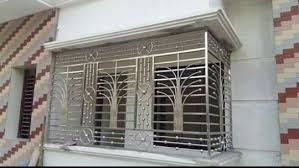 Balcony safety grill designs with plant pot ~ ss (stainless steel) grill designs~ ms grill designs~ iron grill designs. Balcony Covering Steel Grill Design Steel Door Design Window Grill Design