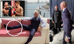 Conor mcgregor of ireland poses outside of the octagon before competing against khabib nurmagomedov of russia in their ufc. Conor Mcgregor Leg Injury What Really Happened To Conor S Leg At Ufc 257 Main Event Against Dustin Poirier
