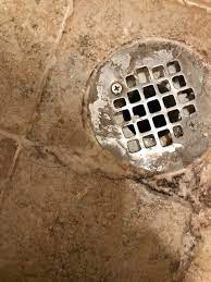 The question is about the shower drain. Calcium Build Up Bad Shower Pan Ceramic Tile Advice Forums John Bridge Ceramic Tile