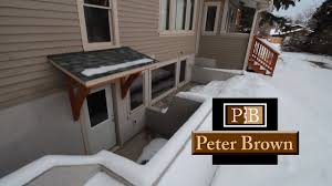 Build the first floor of your plan at the location of the slope in your terrain. Creating A Daylight Basement In Bozeman Mt Part 2 Youtube