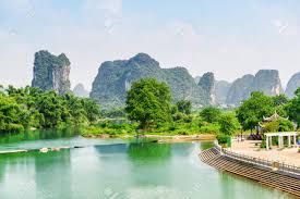 Relieved to have finally arrived at yulong bridge, we sat down at a local restaurant. Wonderful View Of The Yulong River With Azure Water At Yangshuo Stock Photo Picture And Royalty Free Image Image 90431095