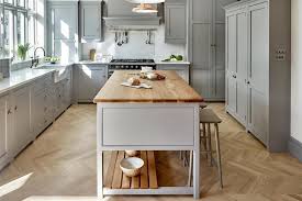 Solid clay pavers, one foot by one foot square, for a rich, warm feeling in your kitchen. Cool Kitchen Flooring Ideas That Really Make The Room Loveproperty Com