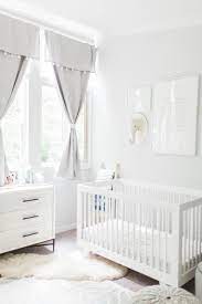This Gender Neutral Nursery Is Singing The Blues Baby Room Ideas White Nursery Baby Room Nursery Neutral