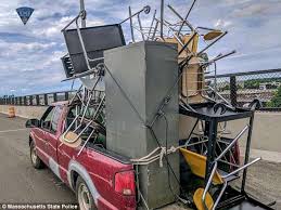 Overloaded junk pickup truck in supermarket parking lot san francisco. Massachusetts Police Post Hysterical Photo Of Pickup Truck Overloaded With Furniture Express Digest