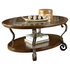 20 top types of wooden oval coffee tables. Signature Design By Ashley Nestor Traditional Glass Top Oval Coffee Table W Fixed Shelf Medium Brown Buy Online In Bahamas At Bahamas Desertcart Com Productid 11356474