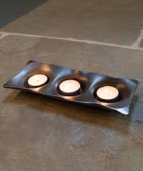 The candle holders come in a black and copper color combination. Wrought Iron Candle Holders And Tealight Holders Buy Wrought Iron Tealight Holders