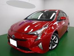 Other extras are bundled in two packages: Used Toyota Prius Pictures 2016 Model Red Color Photo
