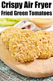 These crispy coated green tomatoes provide a tangy flavor and crunchy texture that goes well with many foods. Keto Air Fryer Fried Green Tomatoes Ninja Foodi Fried Green Tomatoes