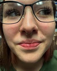 How cute is she rocking a brand new septum piercing 💪🏻😍. Done earlier  this week with standard titanium jewelry. #professionalpiercer #getpierced  #ladypiercer #septumpiercings #nosepiercing