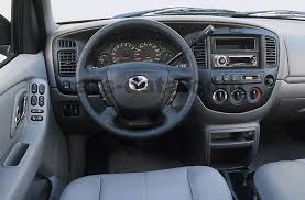The tribute i sport ($19,495) comes with cloth interior, air conditioner with pollen filter. Mazda Tribute Images 9 Of 10 Cars Data Com