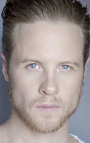 Эштон Холмс