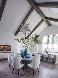 We did not find results for: Large Round Stone Top Dining Table With White Wingback Dining Chairs Cottage Dining Room