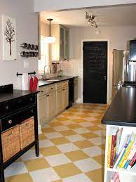 Flooring White And Yellow Marmoleum Flooring With Black Cabinets And Black Countertop Plus Glass Window Kitchen Renovation Kitchen Remodel Kitchen Floor Tile