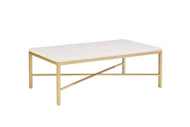 the slender contemporary profile of joanna s luxe coffee table makes it the perfect addition for modern spaces its white mar coffee table magnolia homes table