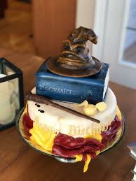 Harry Potter Birthday 9 3 Layer Bottom Tier With A 8x4 Book Cake And Topped With A Modeling Choco Harry Potter Birthday Cake Harry Potter Birthday Book Cakes