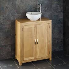 Discover the best small bathroom designs that will brighten up a wood floor and vanity give this city bathroom a warm and serene feeling. Narrow Vanity Unit For Small Spaces Oak Cabinet Round Basin